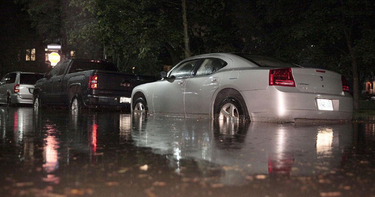 Cars in the Beach partially submerged in water following overnight flooding