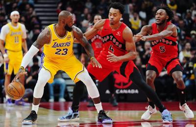 LeBron James's historic streak of double-digit scoring ends as Lakers top Raptors