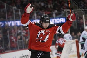 Jack Hughes has a goal and an assist, Nico Daws makes 27 saves to lead the Devils over Seattle 3-1
