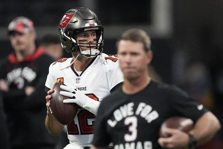 Bucs’ Brady breaks own record but suffers 1st losing season