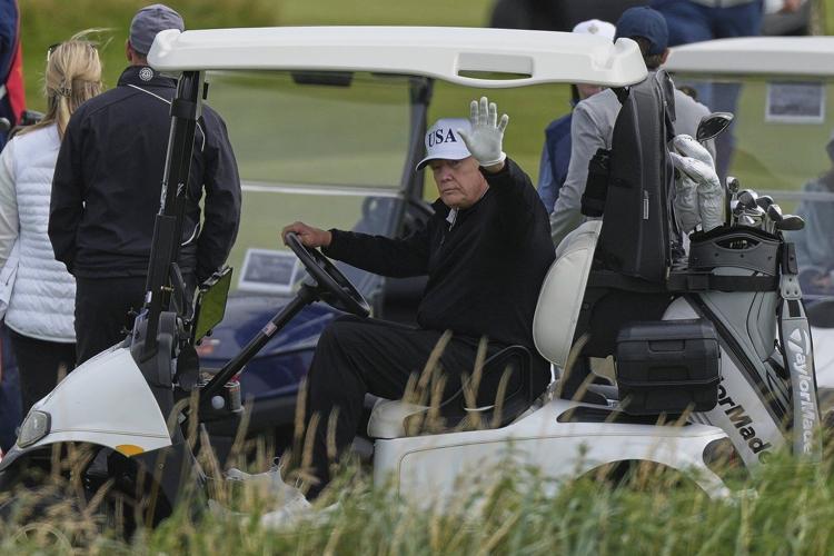 Trump plays golfs in Scotland while protesters take to the streets and decry his visit