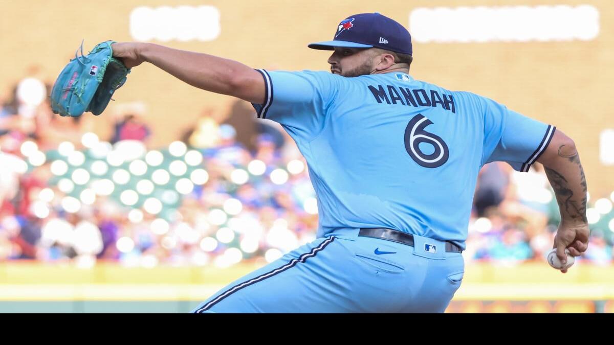 Alek Manoah of the Toronto Blue Jays delivers a pitch in the first News  Photo - Getty Images