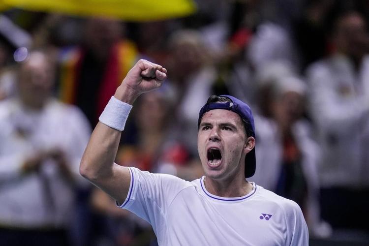 Germany wins both singles matches to top Canada and reach Davis Cup