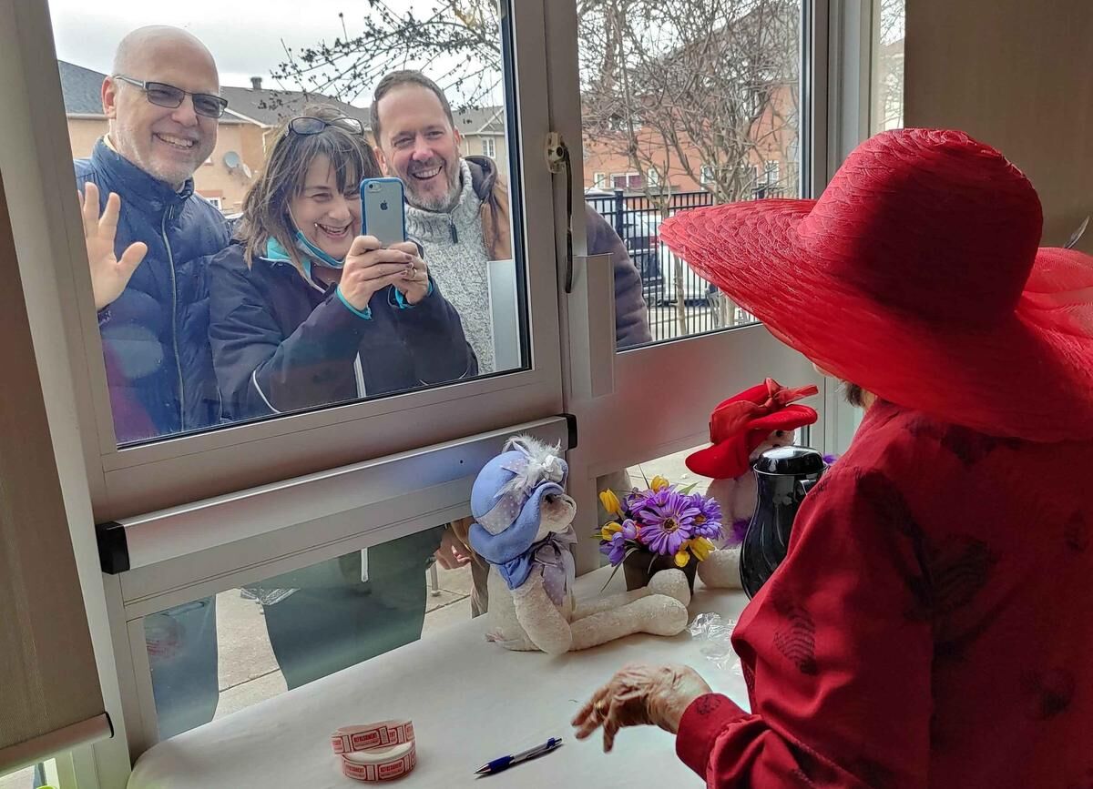 Through the nursing home glass here s how residents visit with