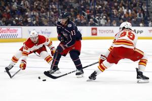 Danforth has goal and an assist, Martin stops 36 shots as Blue Jackets beat Flames 3-1