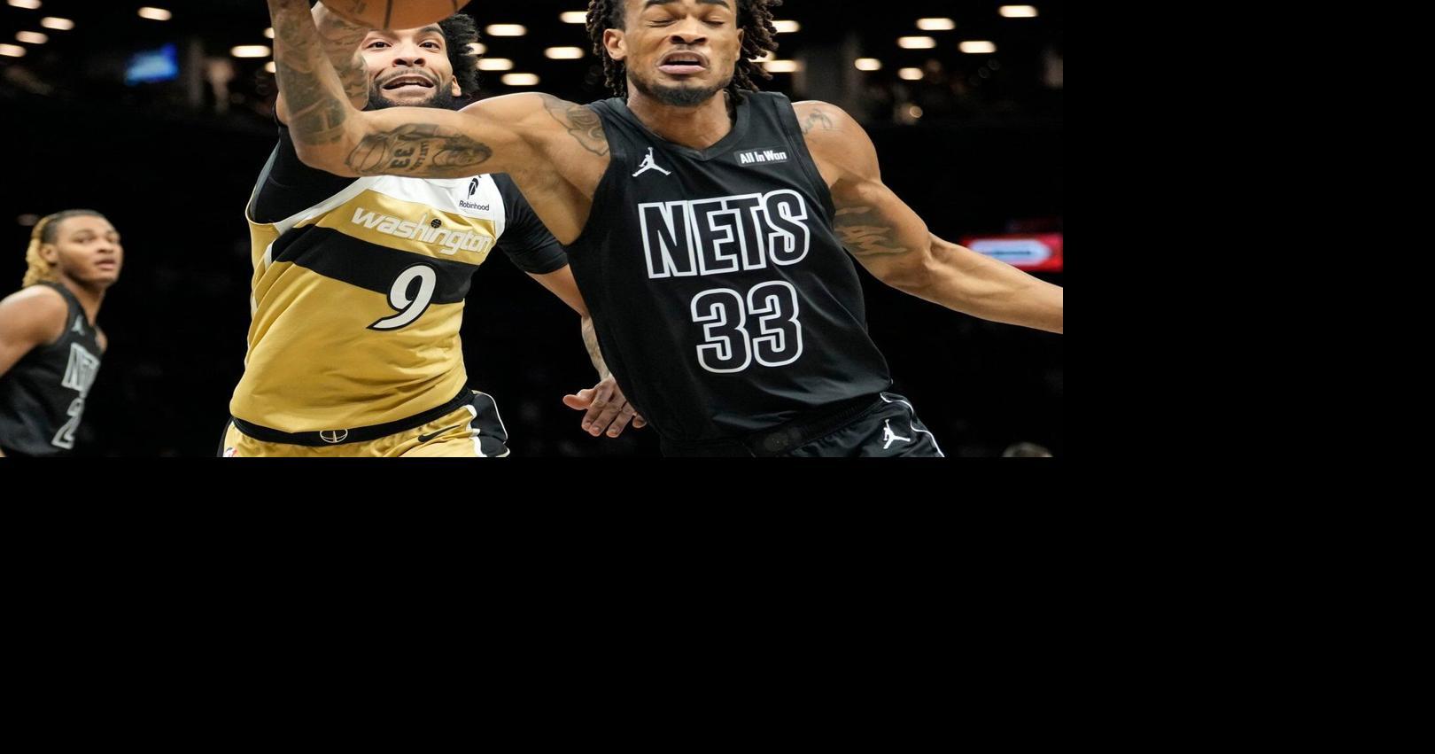 Nets score 80 points in the first half and beat the short-handed Wizards 127-113