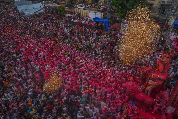 Photos show Indians marking final day of Ganesh Chaturthi that ends with sea immersion
