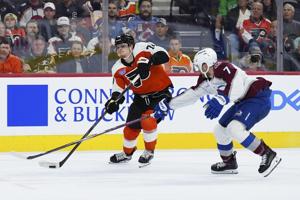 Makar scores 2 goals to lift Colorado past Flyers 3-2 in game marred by injured referee