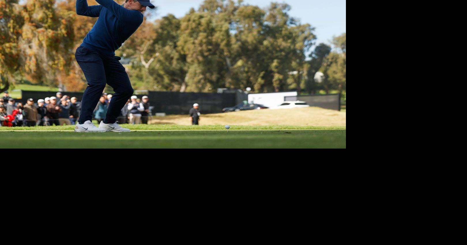 Rory McIlroy handles the rain and then wind to share clubhouse lead at Riviera