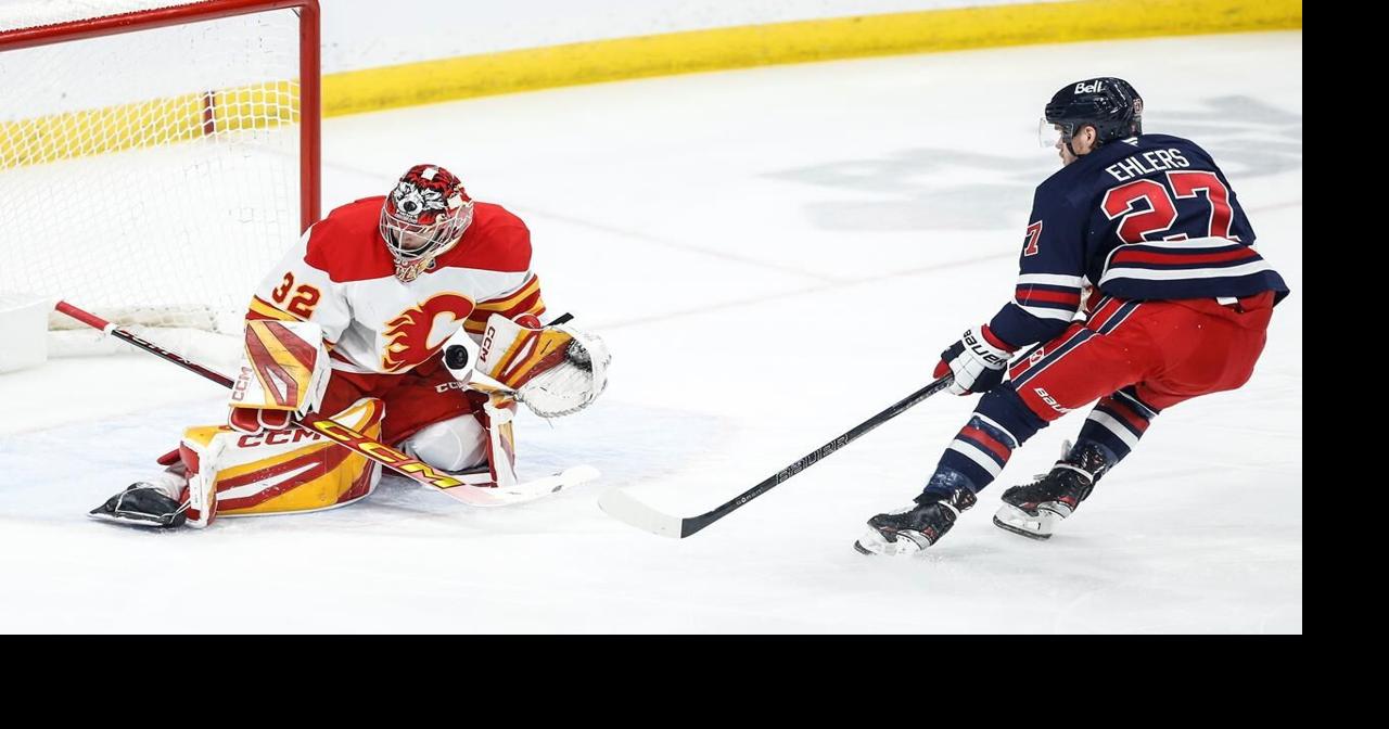 Wolf, Coleman lead Flames past Jets 3-1