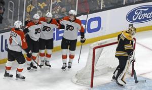 Zacha scores in overtime as the Bruins rally past the Flyers for their 4th straight win