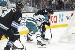 Wennberg's OT goal gives Sharks 5-4 win over Utah for 1st win