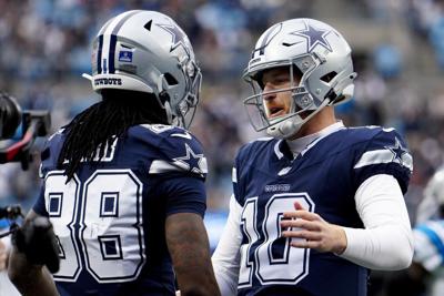 Rush throws for career-high 3 TDs, Cowboys force 4 turnovers to beat Panthers 30-14