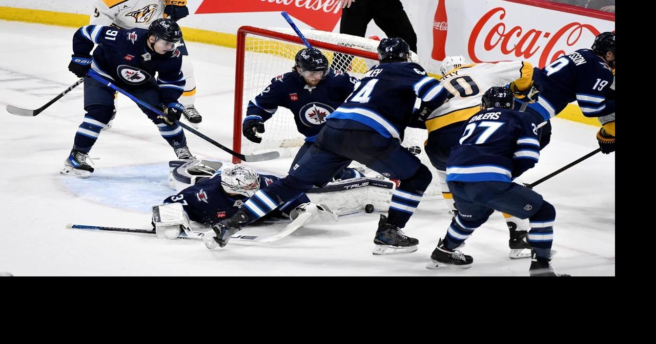 Emotional Hellebuyck shares 300-win milestone with fans, teammates