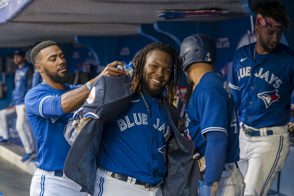 From far and wide, Dominicans converge, boost Blue Jays