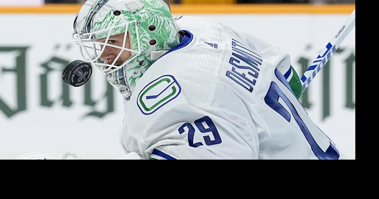 Canucks pull off comeback, top Predators 4-3 in OT