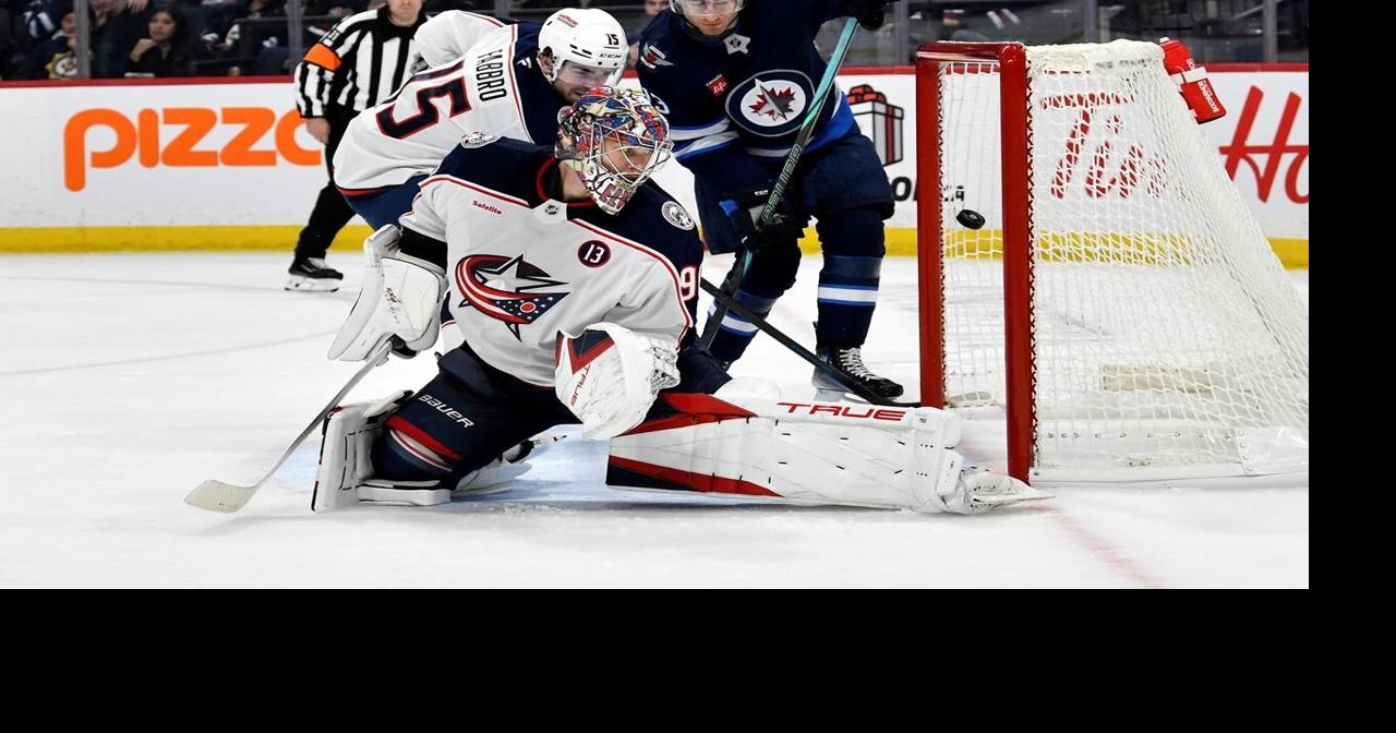 Johnson scores twice in the third as Blue Jackets ground Jets 4-1
