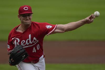 Reds beat Marlins 6-0, earn split in four-game series