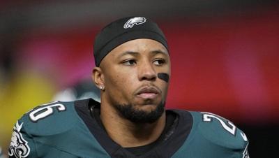 Eagles running back Saquon Barkley sets the NFL's season rushing record, including the playoffs