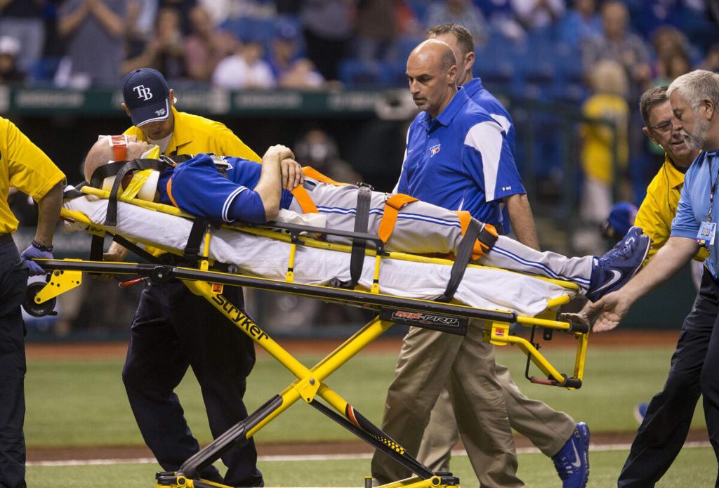 Happ hit in head by line drive, Blue Jays beat Rays