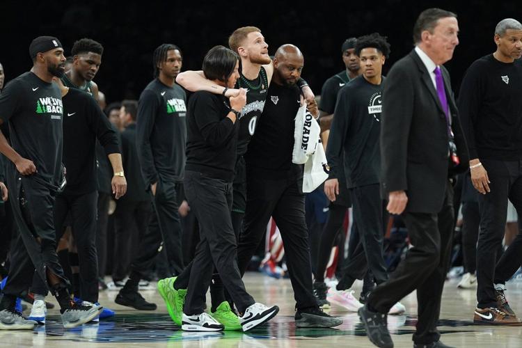 Timberwolves Injuries Timberwolves lose Anthony Edwards and Donte DiVincenzo to leg injuries ...
