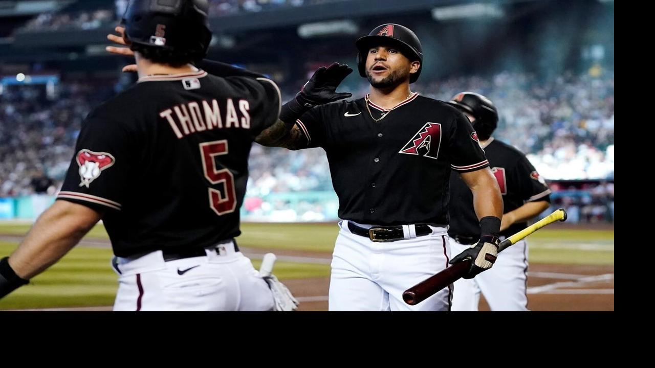 Arizona Diamondbacks' Daulton Varsho celebrates his three-run home run  against the San Francisco Giants during the eighth inning of a baseball  game Tuesday, July 5, 2022, in Phoenix. (AP Photo/Ross D. Franklin