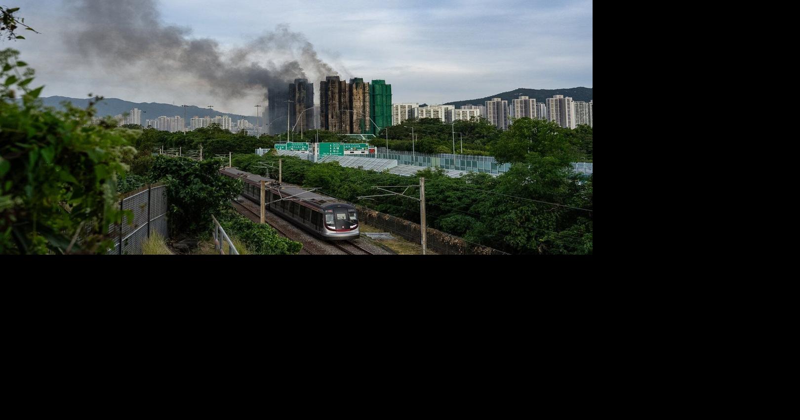 Hong Kong blaze death toll rises to 128, criminal arrests widen