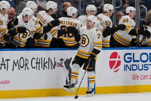 Khusnutdinov scores tying goal in 3rd, adds lone shootout goal in Bruins' 4-3 win over Islanders
