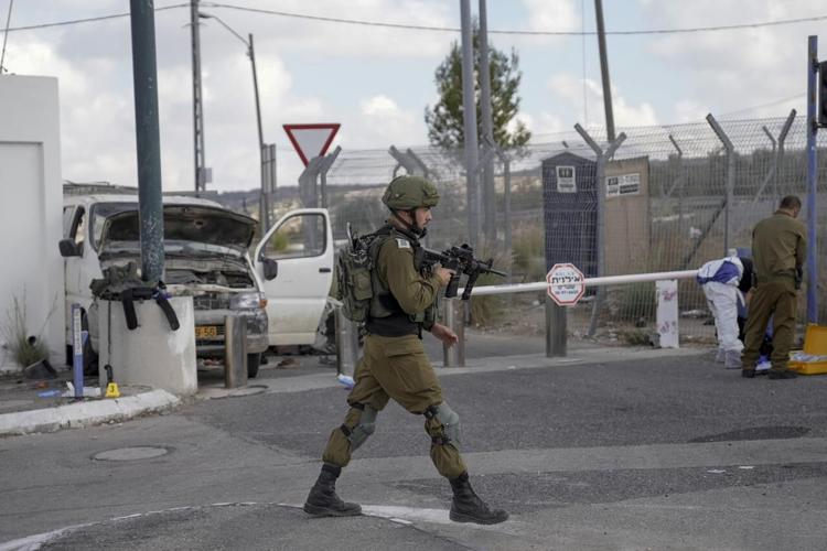 Palestinian shot dead after driving car into Israeli officer