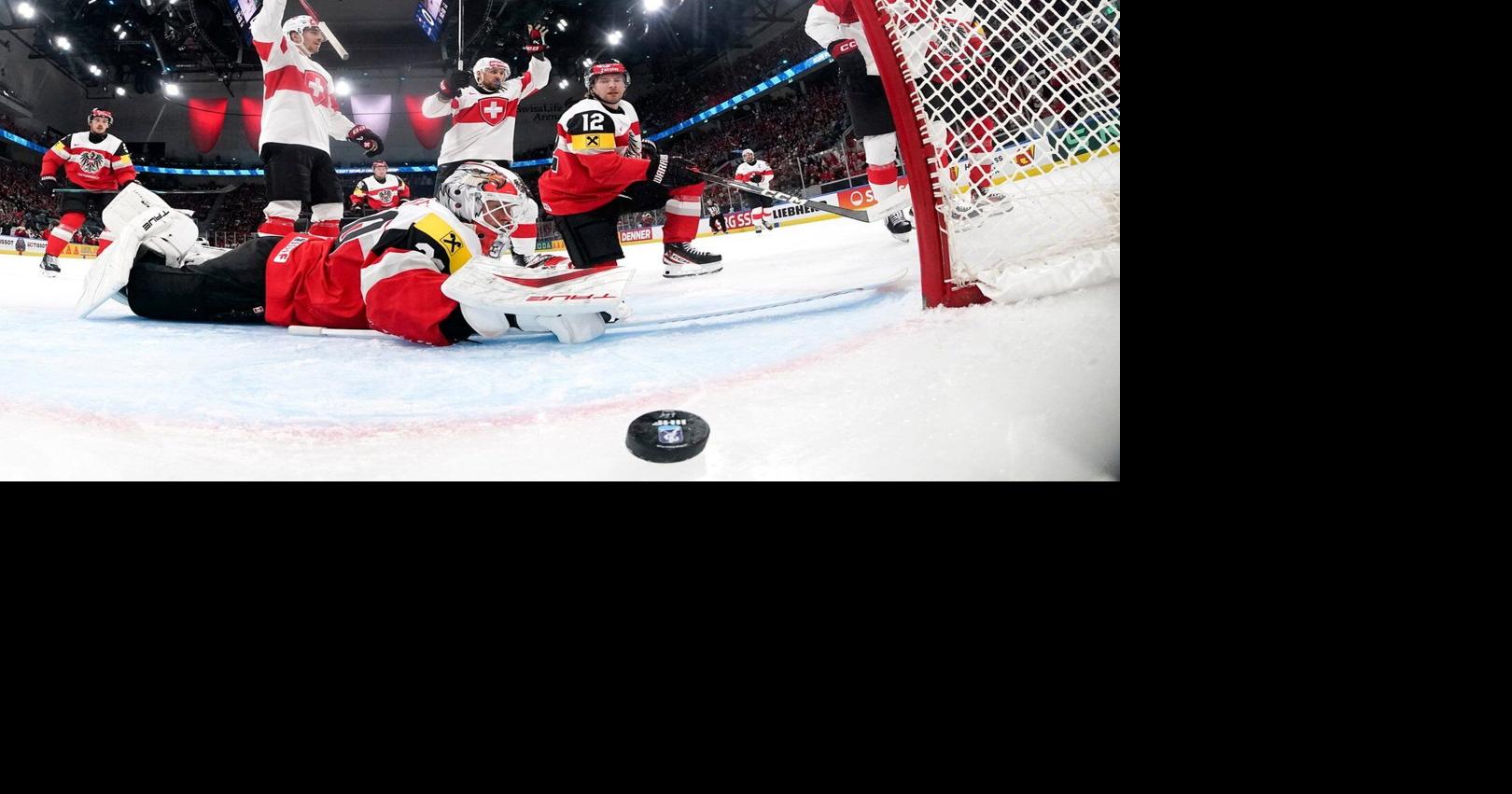 Switzerland routs Austria 9-0 to stay perfect at ice hockey worlds, US faces Germany