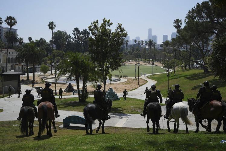 Residents still shaken a day after federal authorities march through Los Angeles' MacArthur Park