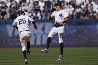 Cole gets 5th win, Yankees hit 3 HRs in 4-2 win at Texas