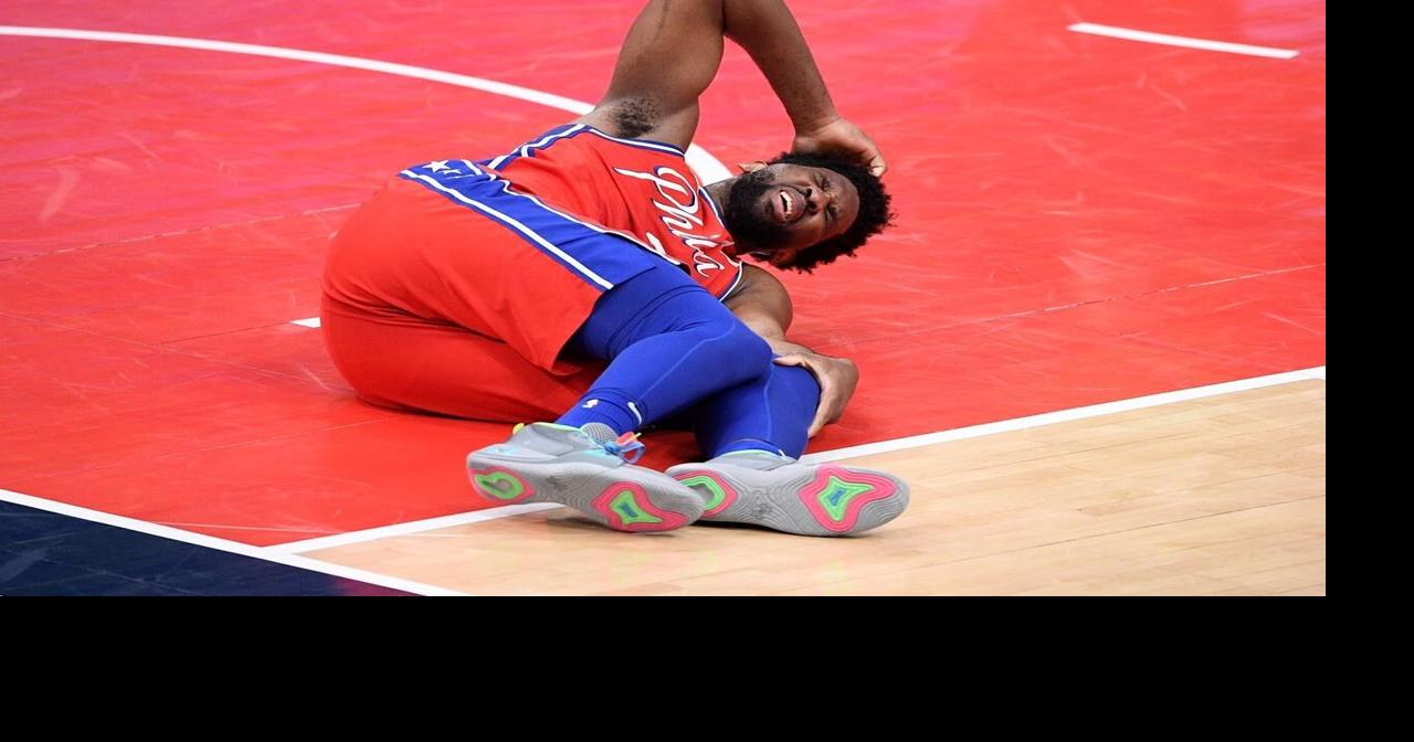 Embiid exits game following awkward landing on leg