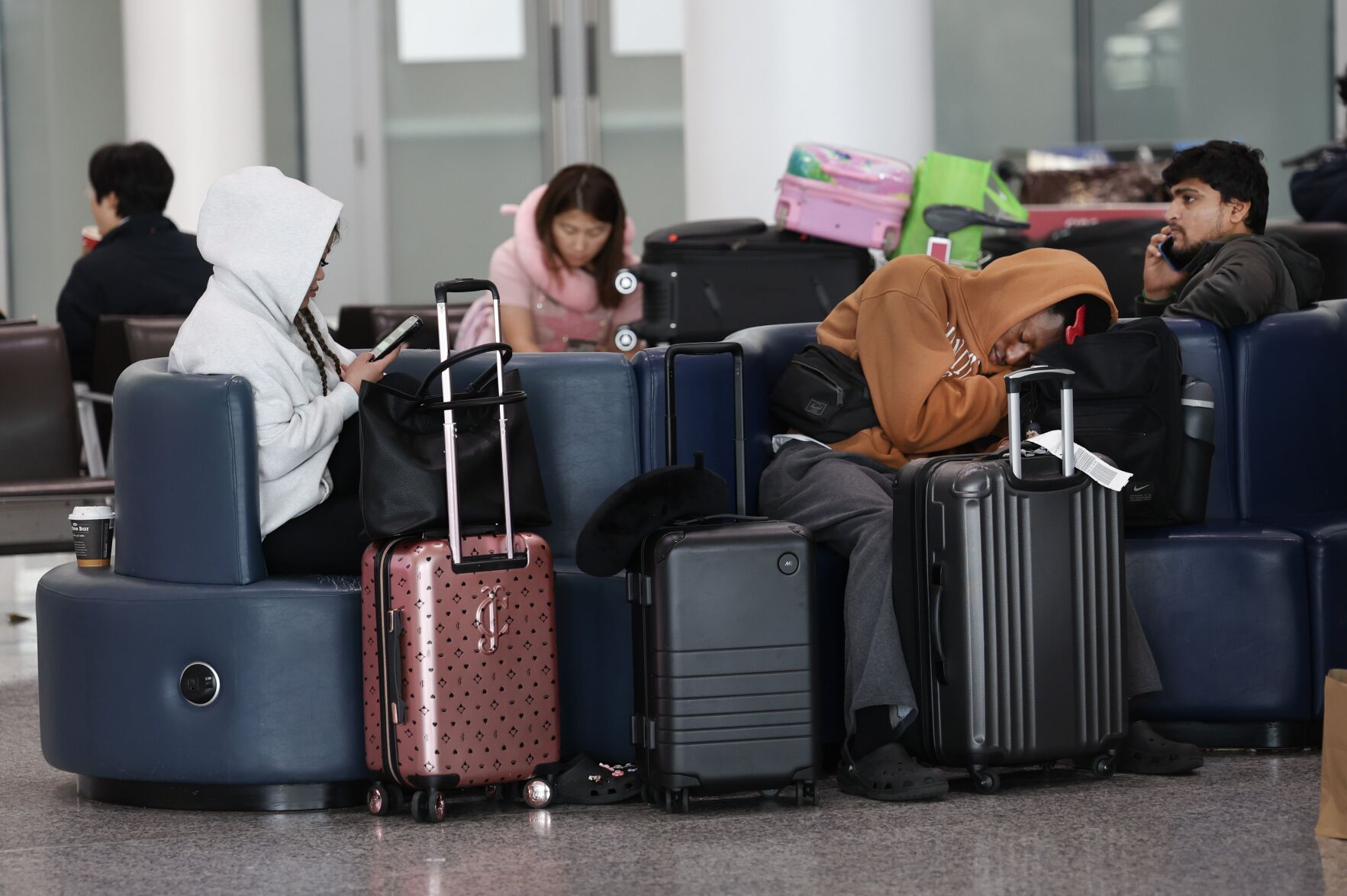 Why major Canadian airlines began charging for carry on bags