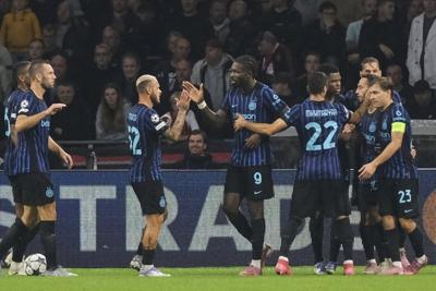 Inter Milan lifted by Thuram's soaring headers in pain-free return to Champions League