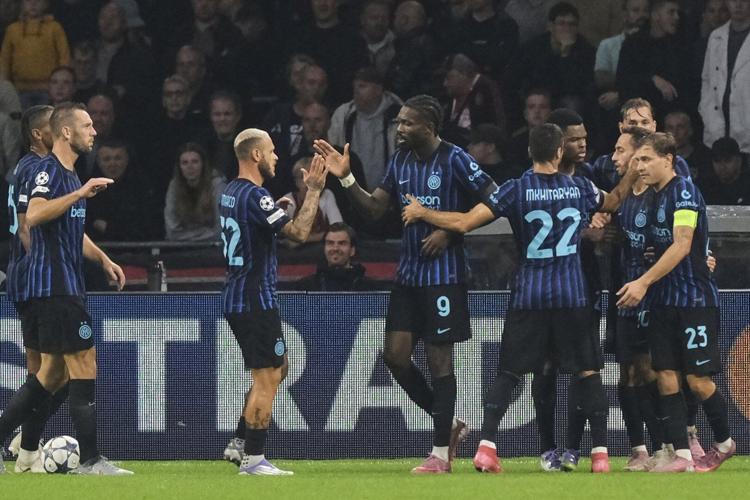 Inter Milan lifted by Thuram's soaring headers in pain-free return to Champions League