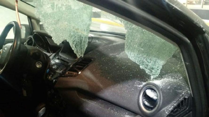 Passengers escape serious injury after ice boulder crashes through ...