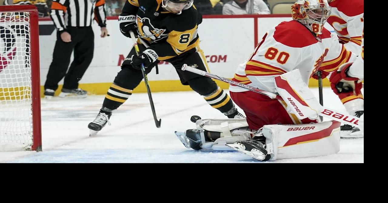 Bunting, Letang lead Pittsburgh Penguins in 6-2 win over Calgary Flames