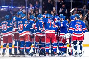 Rangers become 1st NHL team to clinch playoff berth, beat Flyers 6-5 on Fox's quick goal in OT