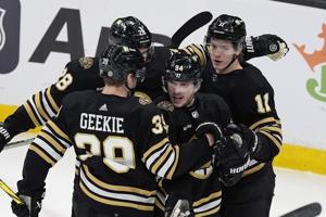Bruins win 5th straight, beat Jets 4-1 in matchup of 1st-place teams
