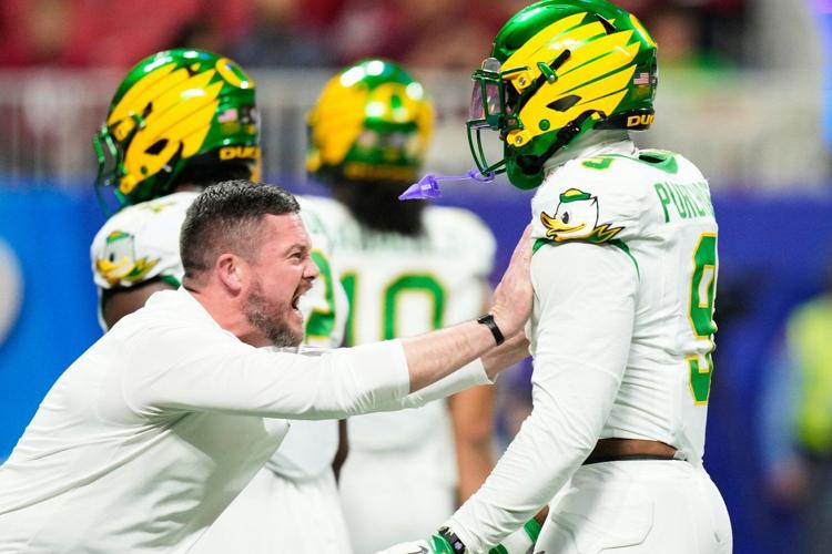 Dante Moore and the Oregon Ducks self-destruct in 56-22 Peach Bowl loss ...