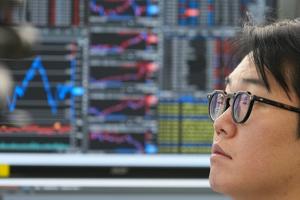 US futures and Asian stocks advance following a rally on Wall Street