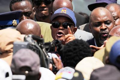 South African president suspends police minister and launches probe into alleged links to criminals