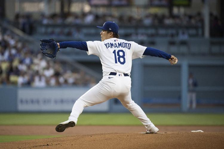 Muncy's sacrifice fly scores Ohtani with go-ahead run in 10th and Dodgers beat D-backs 4-3