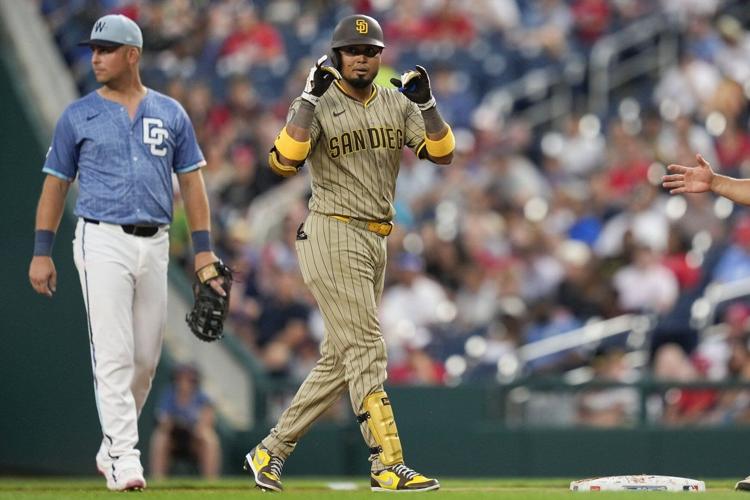 Machado's slam caps 5-run 9th as Padres top Nationals 7-2