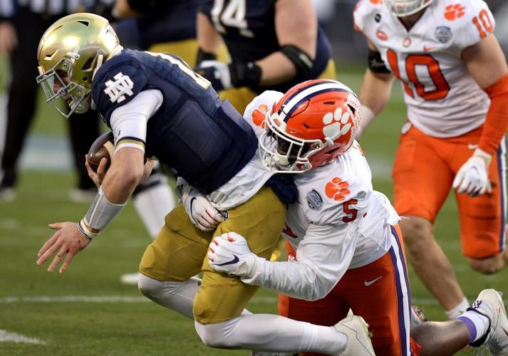 Lawrence, No. 4 Clemson rout No. 2 Notre Dame for ACC title