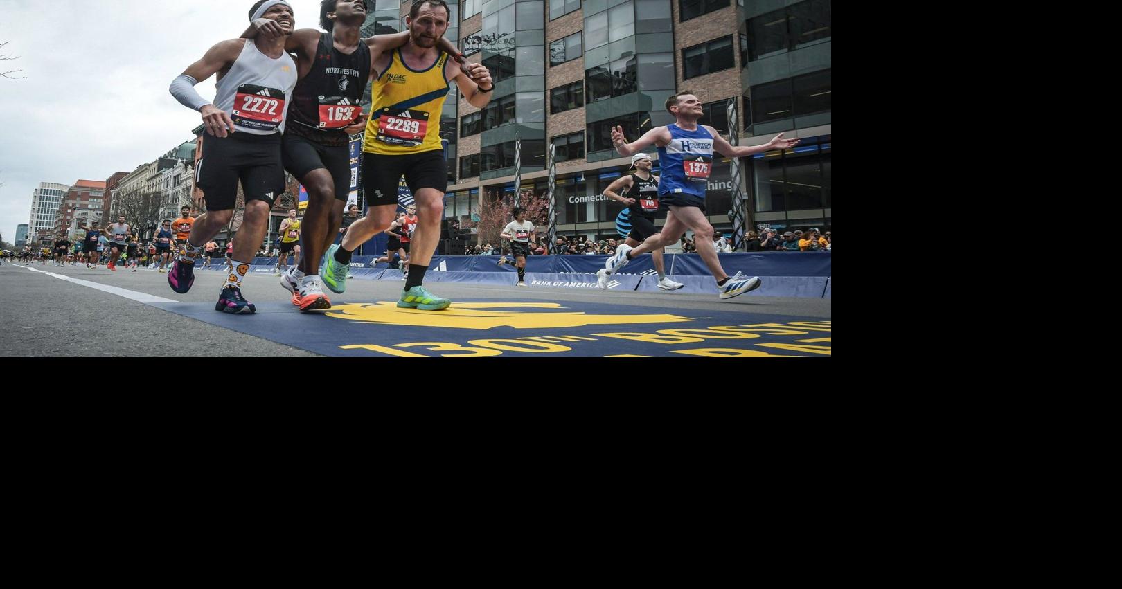 Runners were struggling to finish Boston Marathon when competitors came along and helped them across