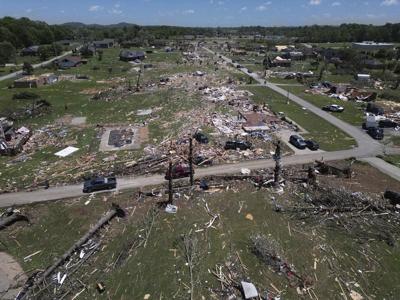 PHOTO GALLERY: Storm systems sweep across parts of the U.S. Midwest and South killing at least 23