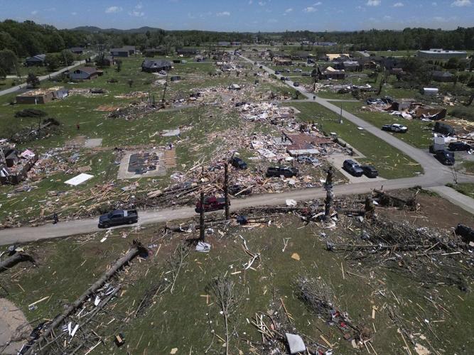 PHOTO GALLERY: Storm systems sweep across parts of the U.S. Midwest and South killing at least 23
