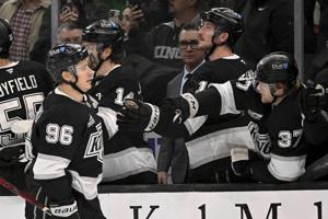 Andrei Kuzmenko gets 1st points for LA since trade, helps Kings pound streaking Hurricanes 7-2